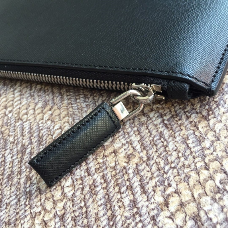 Pra*a clutch bags